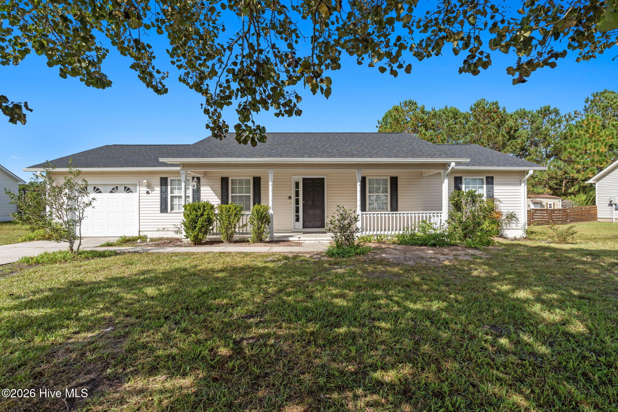 Enjoy the convenience of Shallotte with easy access to Brunswick County beaches in this adorable 3-bedroom 2-bath home in Greenbay Village with NO HOA!Start your mornings with a cup of coffee on the front porch, then enjoy afternoons and evenings entertaining or relaxing on the back deck.Inside, fresh paint throughout creates a bright, clean feel and gives the next owners the perfect blank slate to make the home their own. Both the roof and HVAC were replaced in 2025, offering added peace of mind for years to come.