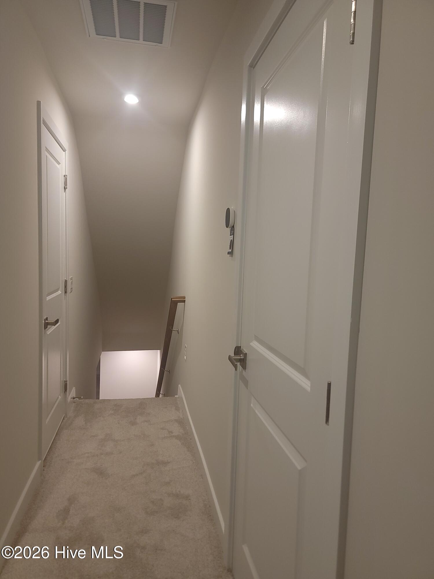 Upstairs Landing. 2 storage areas open directly onto the landing making storage a breeze. Also opening onto the landing are the 2nd and 3rd bedrooms & upstairs bathroom. Very nice floorplan.