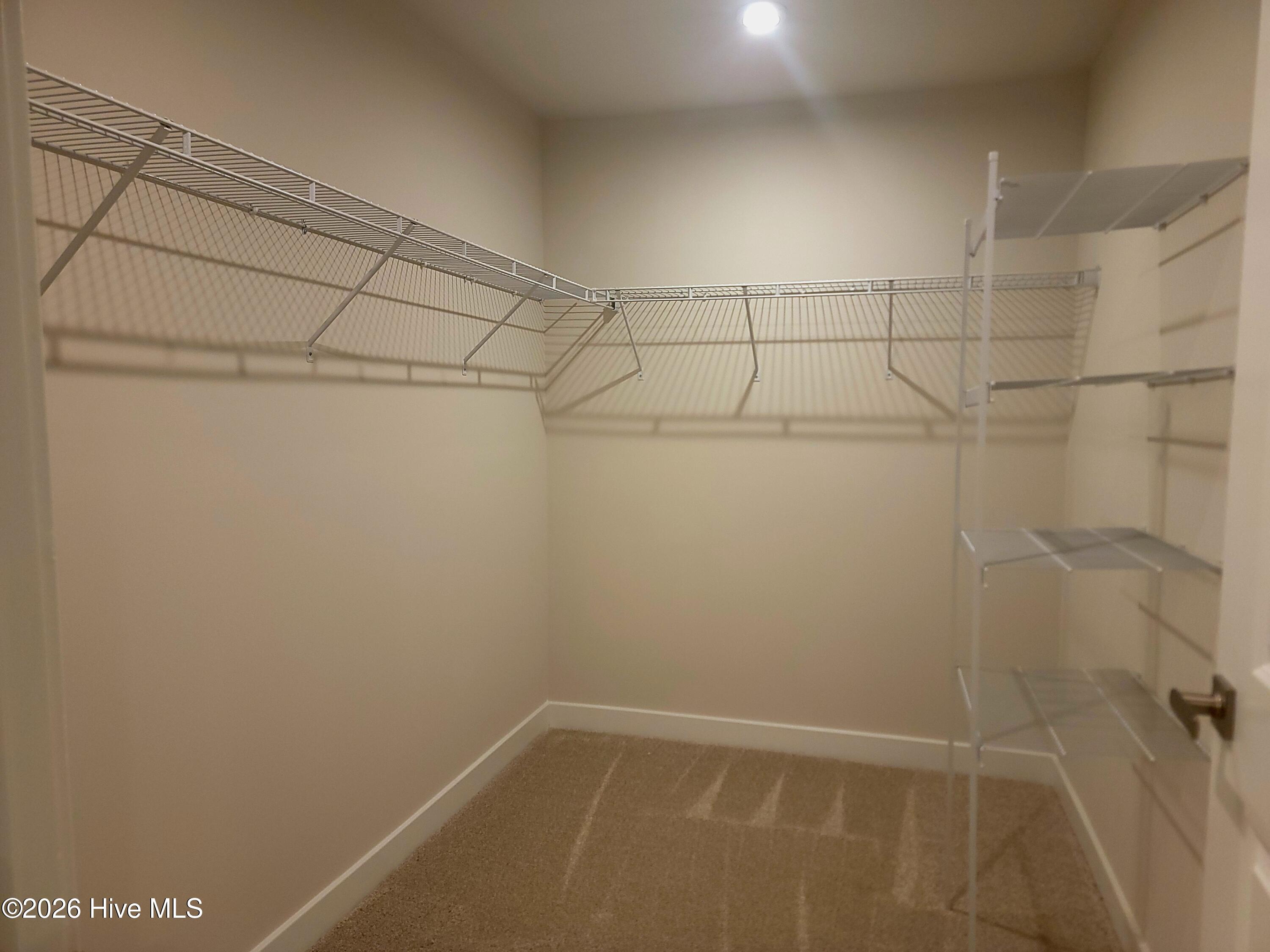 Huge walk in closet in primary Bathroom.