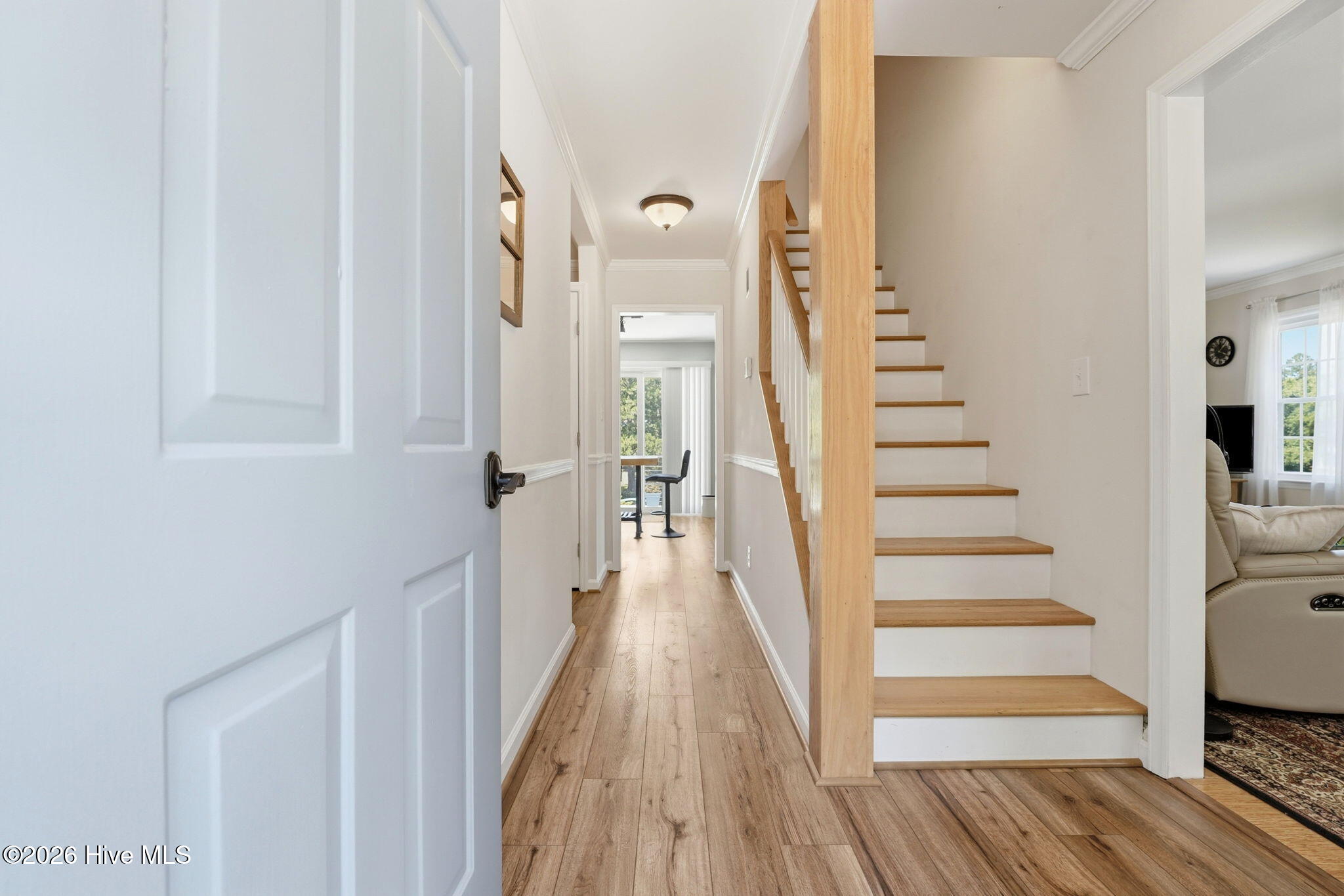 View from the front door entrance. Kitchen straight ahead, living room to the right.