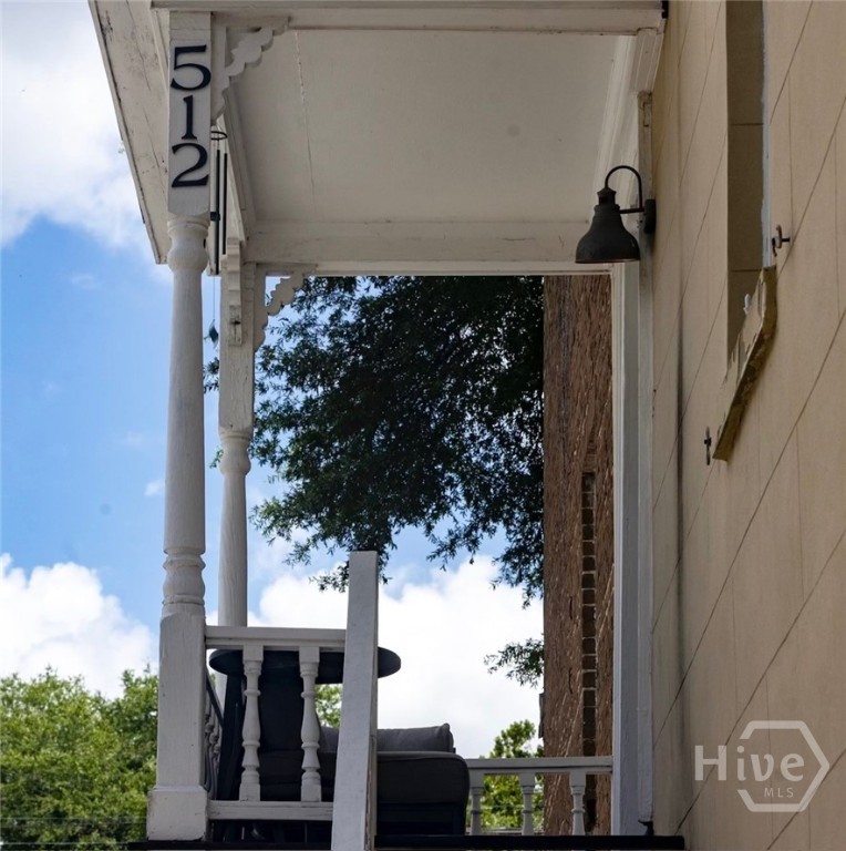 View of covered porch on upper apartment.