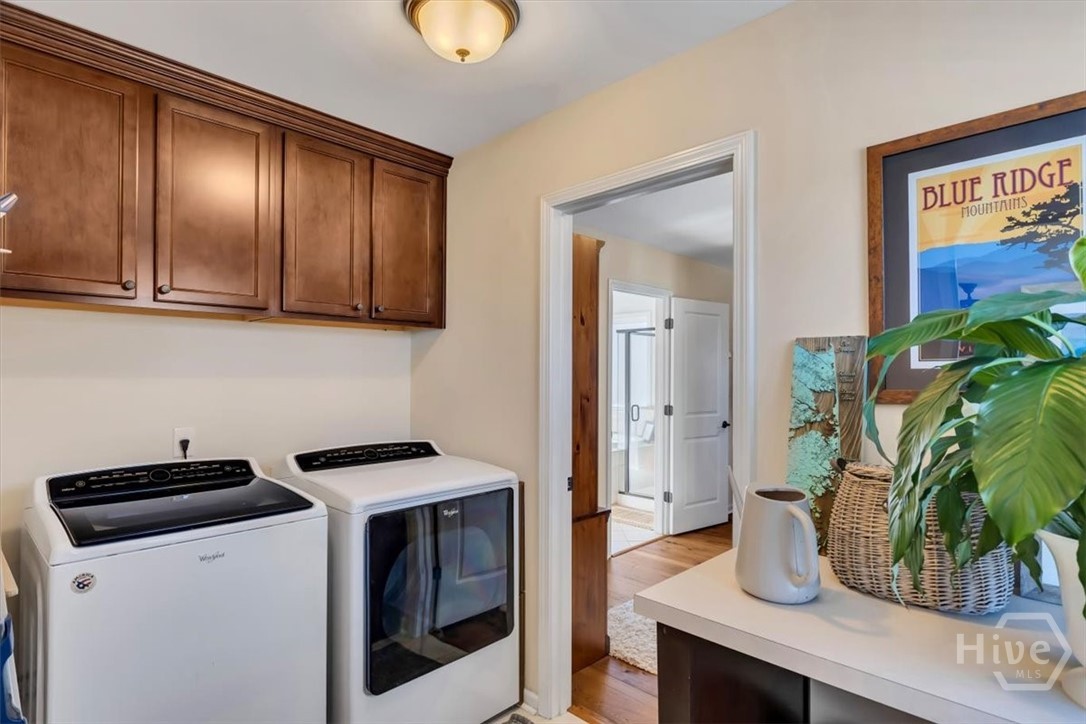 Laundry room conveniently located upstairs