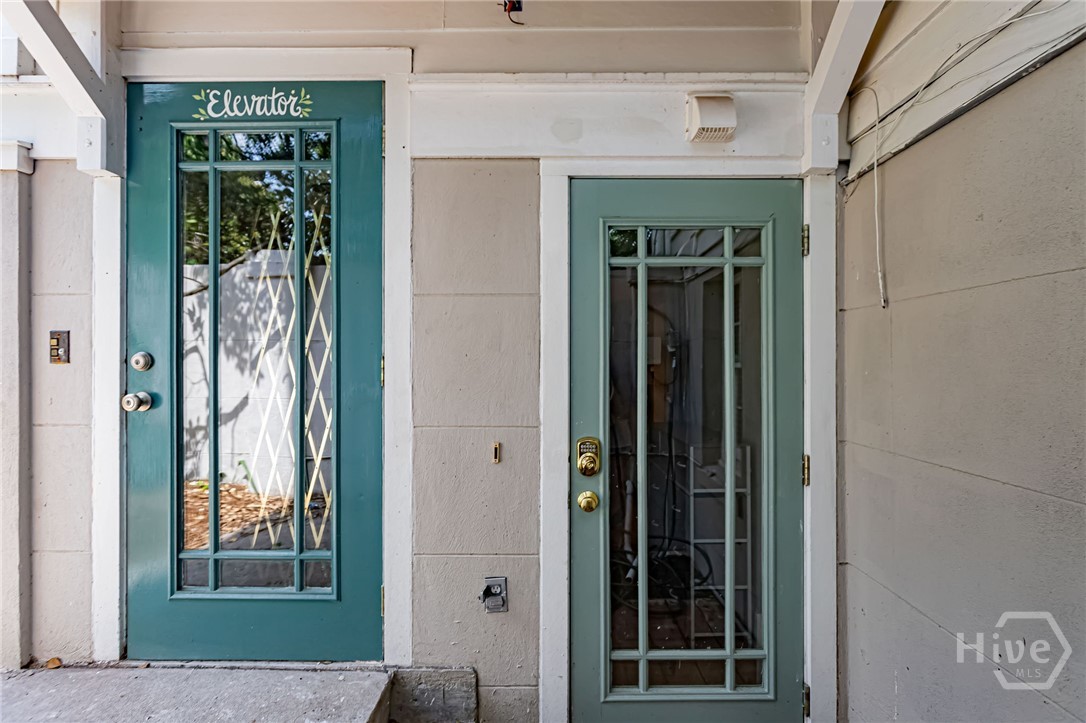 Rear exterior elevator entrance and exterior garden entrance