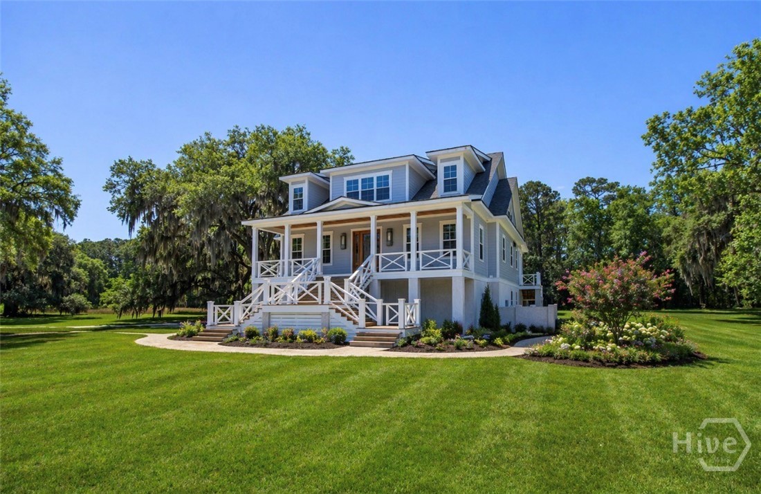 This gorgeous new home is nearly complete… Photo shows virtual landscaping as the landscaping has not been done yet.