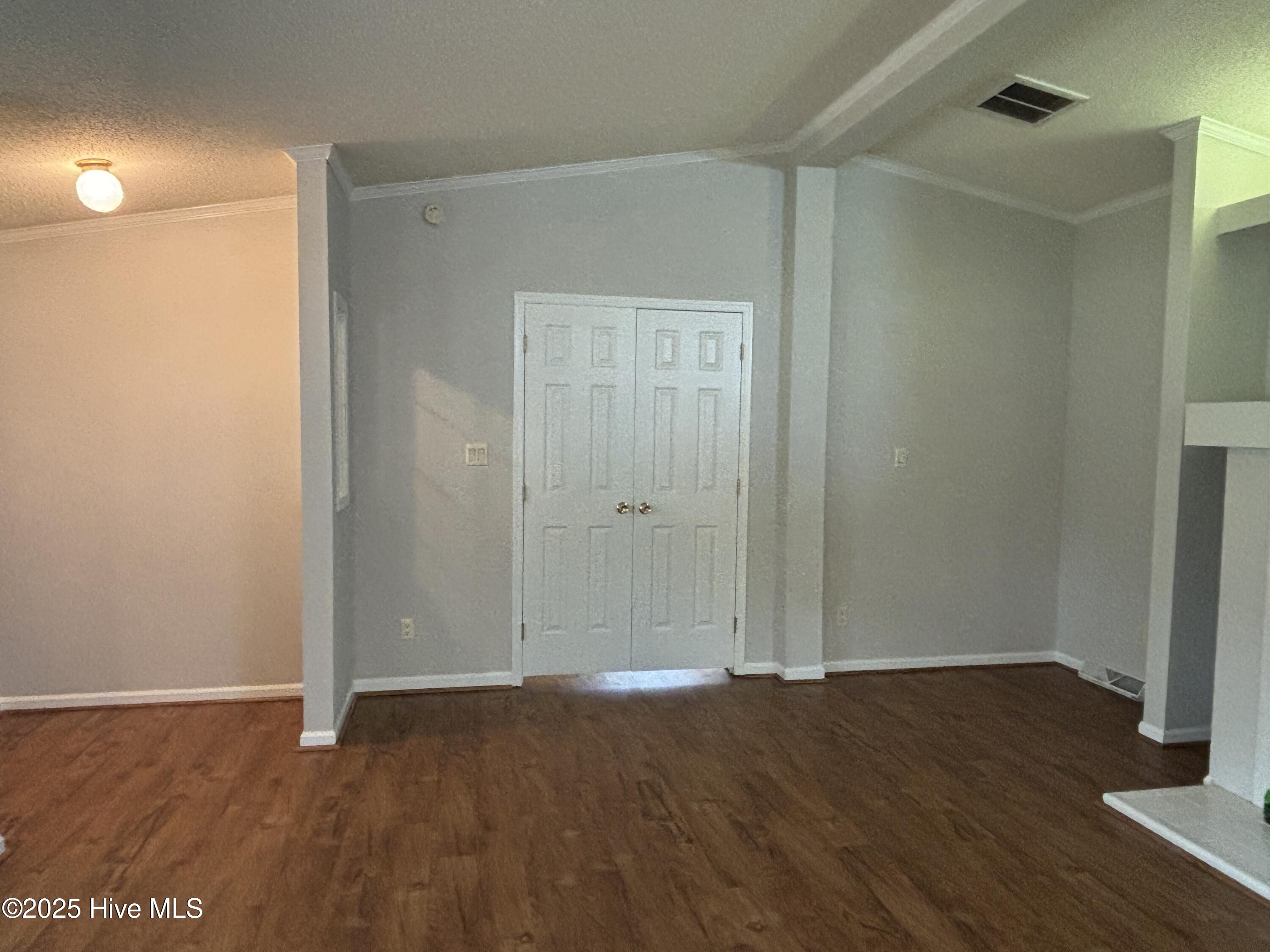 Primary Suite is closed off by Double Doors