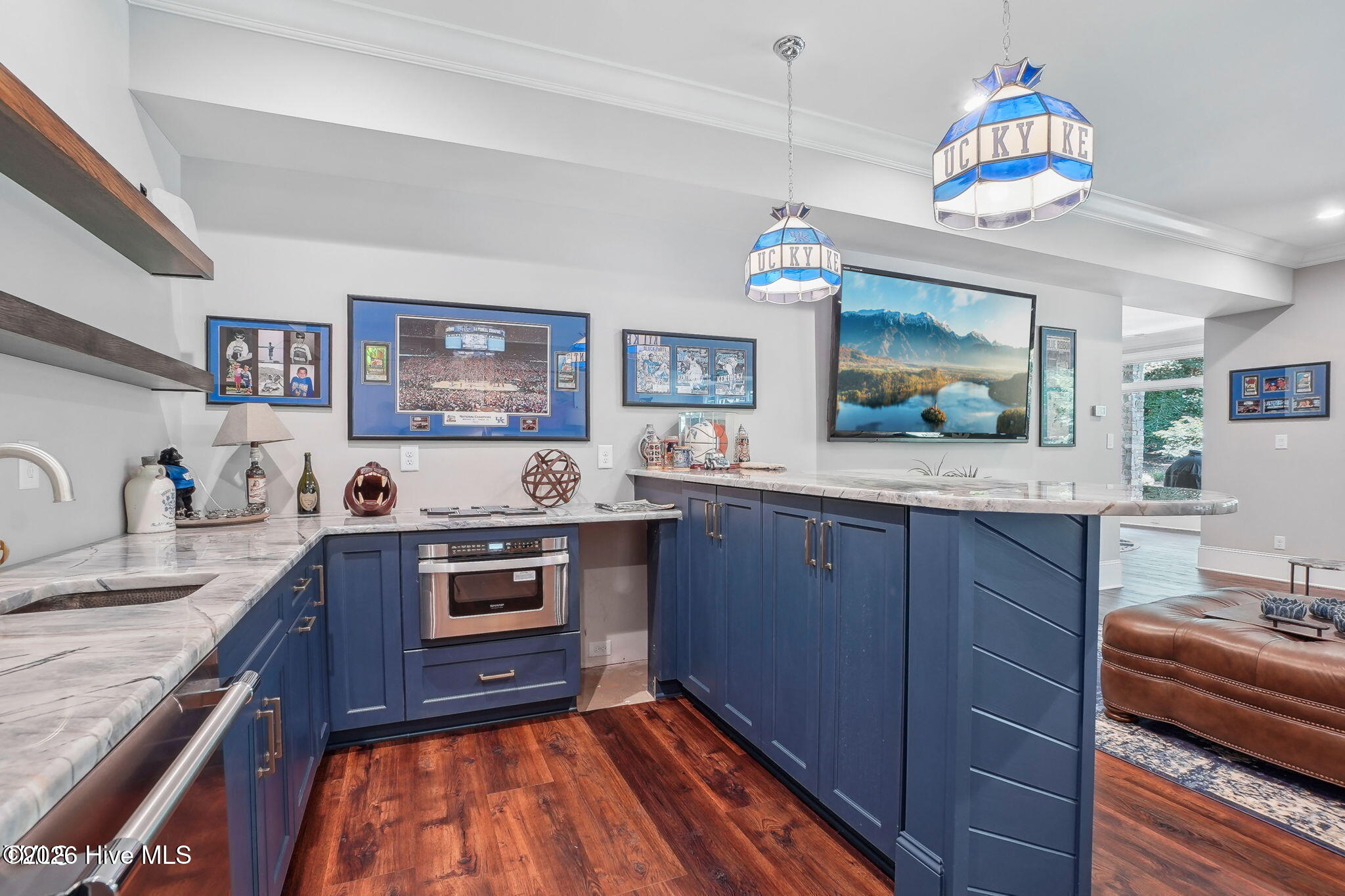 Basement kitchen with dishwasher and microwave