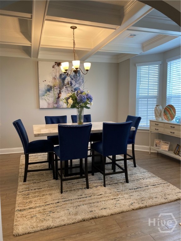 Formal dining area with coffered ceilings
