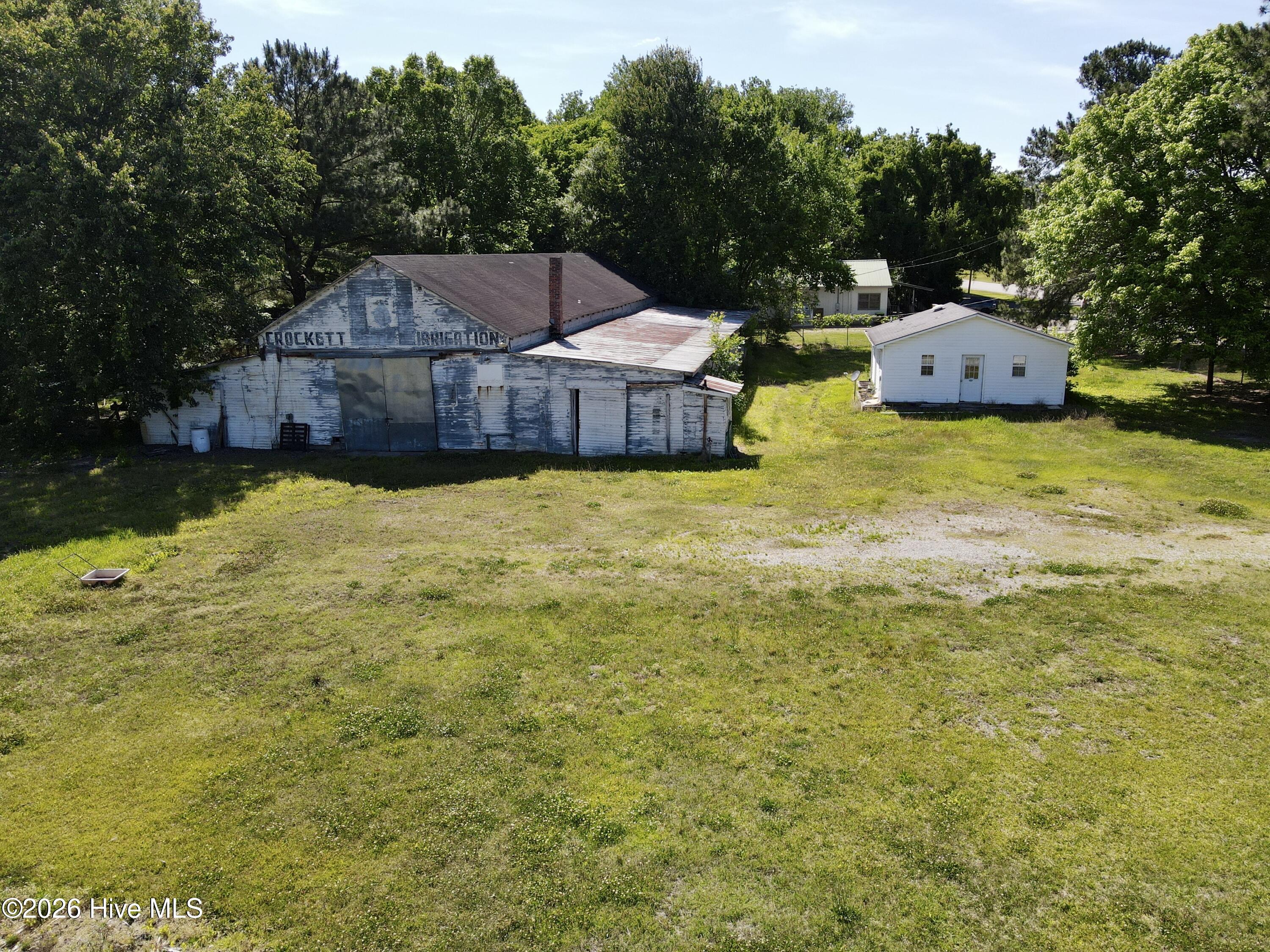 Check out this outstanding commercial opportunity located near the Roanoke River Boat Landing and positioned just off the 4-lane Hwy 17 for excellent visibility and easy access! Situated on an approximate 1.87-acre lot, this property offers the space, location, and flexibility your business needs to grow.The property is completely fenced, making it ideal for equipment storage, inventory, business operations, or a variety of commercial uses. A separate 24' x 24' office building is already in place and features a mini-split system for heating and cooling, along with a convenient half bathroom--perfect for staff, customers, or daily office operations.The large storage warehouse measures approximately 110' deep by 31' wide and provides an impressive amount of usable space. Enclosed lean-to shelters on each side add even more covered storage options, while the interior warehouse includes multiple storage bins to help keep materials, tools, or inventory organized.With a spacious lot, strong road visibility, fenced grounds, office space, warehouse storage, and a prime commercial location, this property is packed with potential. Whether you are expanding your current business, launching a new venture, or looking for a smart investment property, this one is worth a closer look. Schedule your showing today and see all the possibilities this commercial property has to offer!