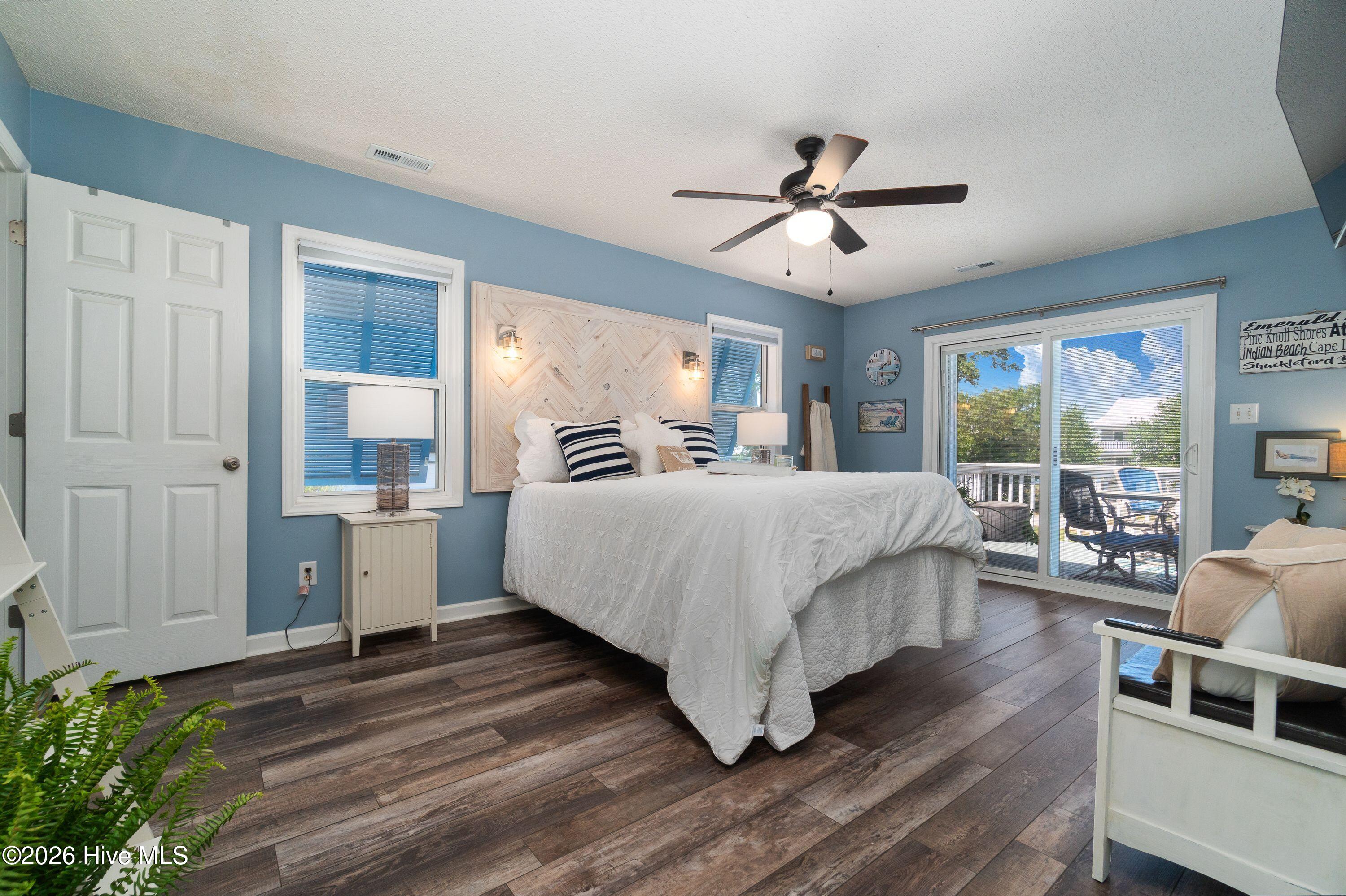 Master Bedroom with walk out sliders to main deck for water views!