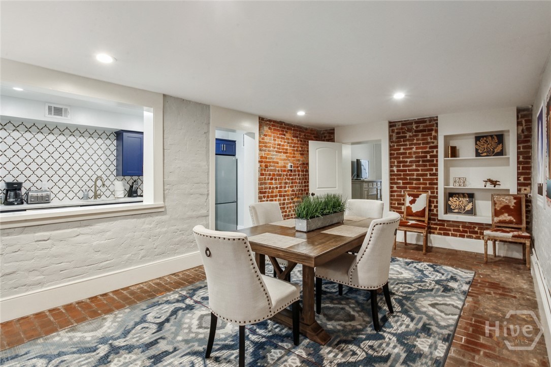 Dining with delightful pass-through to kitchen.