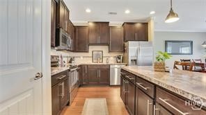 This is NOT the actual Townehome. Pictures were taken from a Finished Austin plan and are for Reference Only