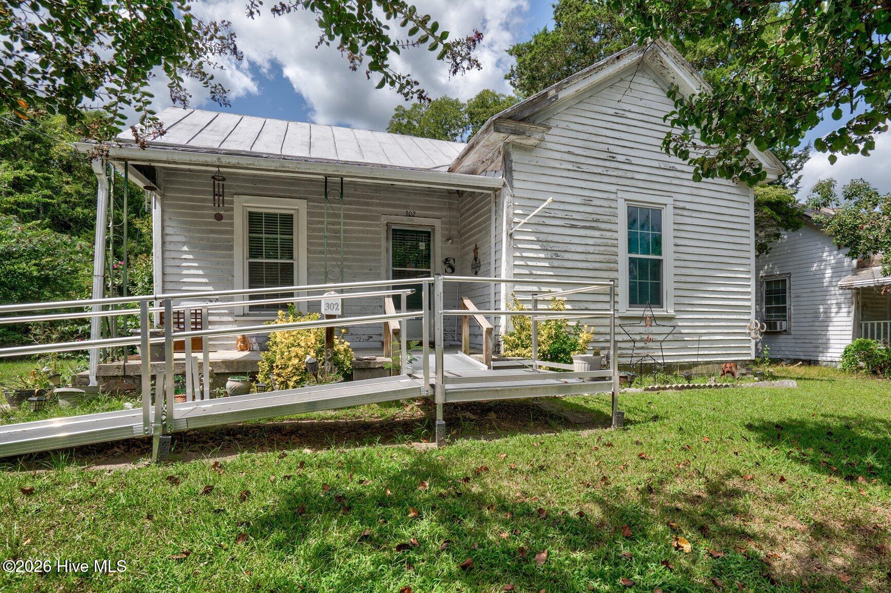 Photo 2 of Single family home for sale at 302 W 1st Street, Tarboro, NC 27886 | MLS# 100603247 | Listing updated on 2026-09-13