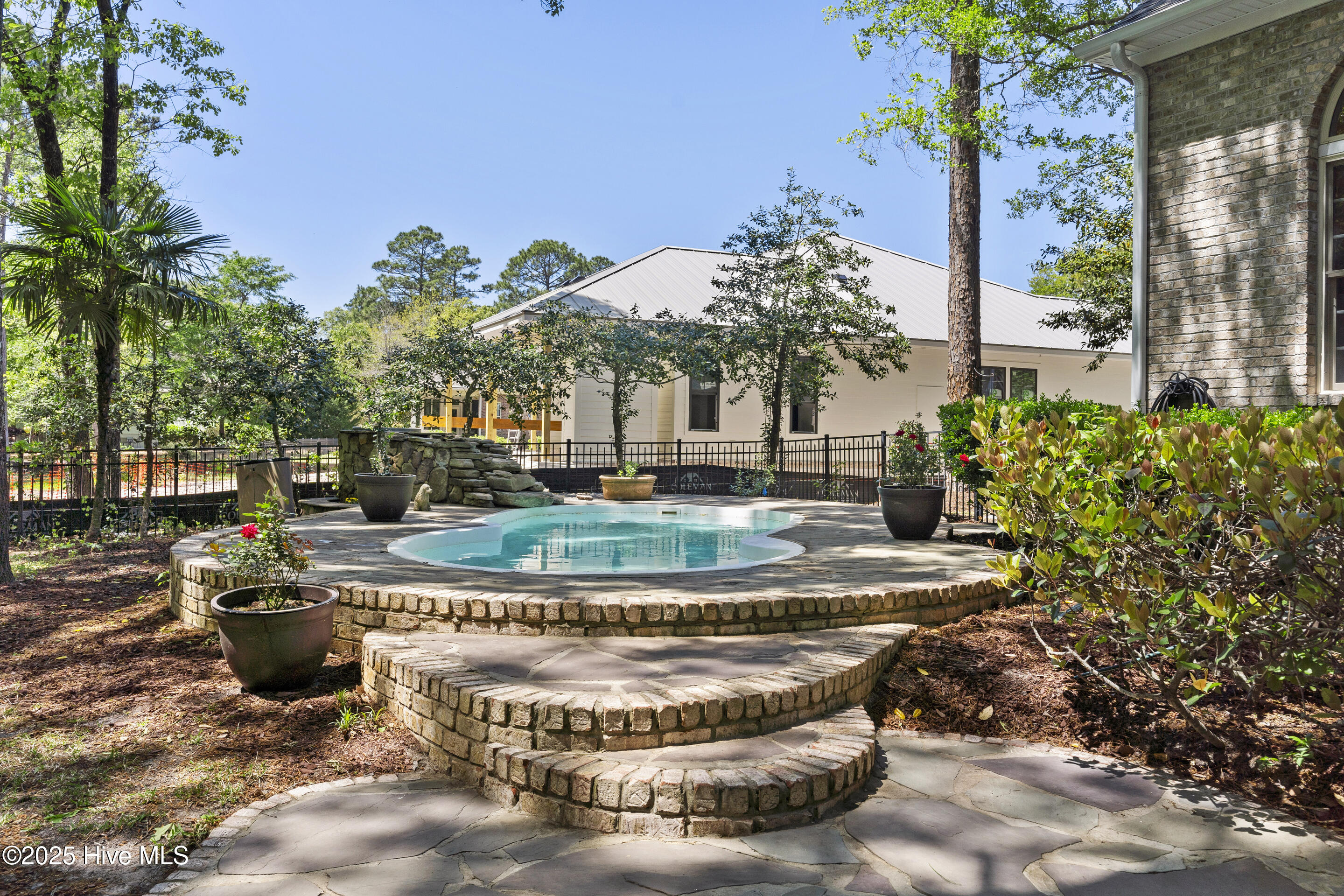 1626 Amberwood Drive SE, Bolivia, NC 28422 – photo 4: Pool Entrance