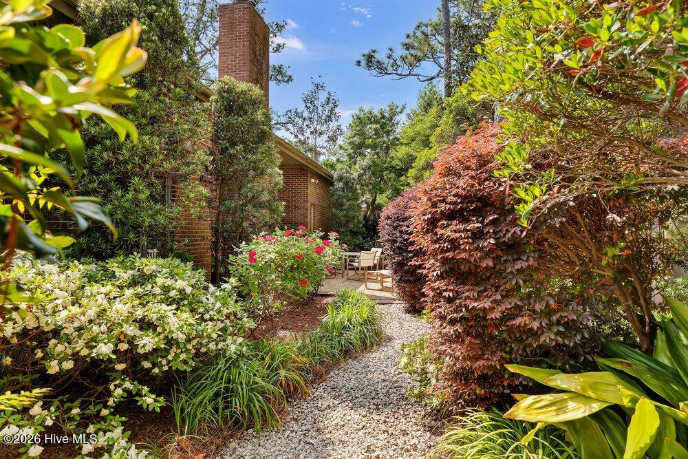 3703 Reston Court B, Wilmington, NC 28403 – photo 16: Rear Garden Pathway