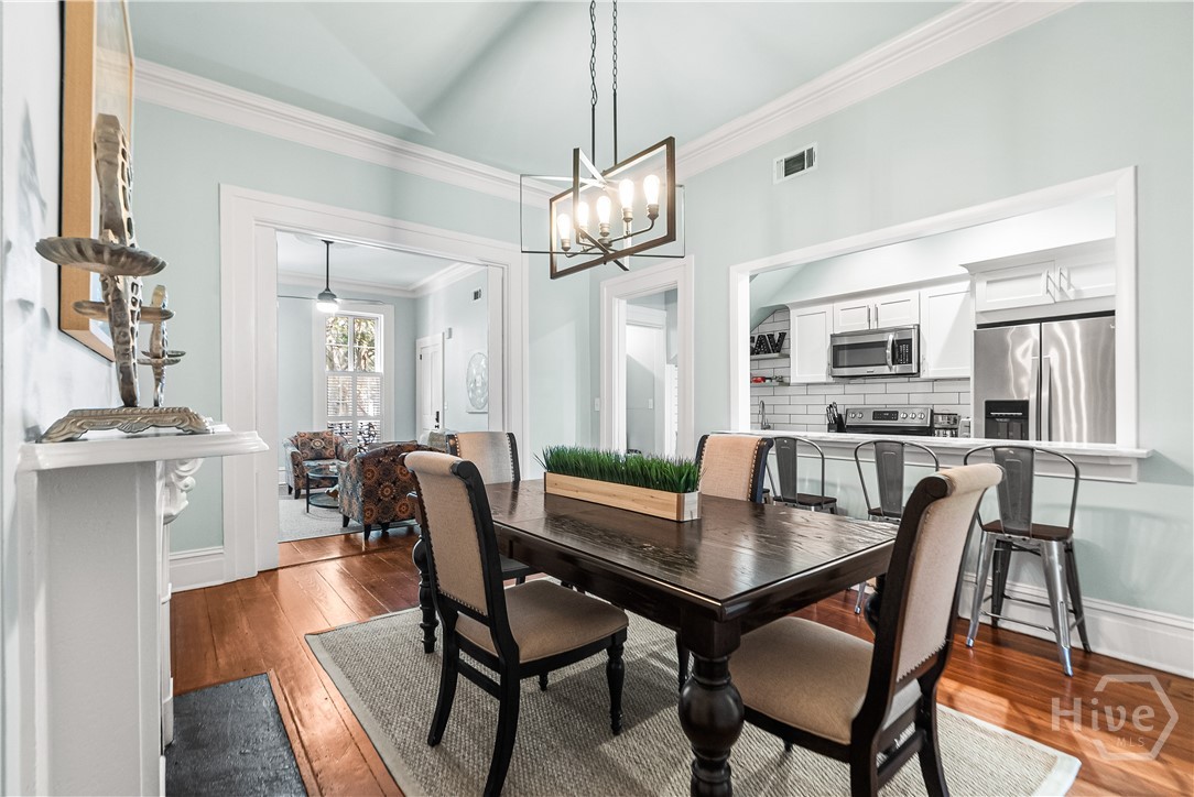 Pass-through to kitchen and bar seating.