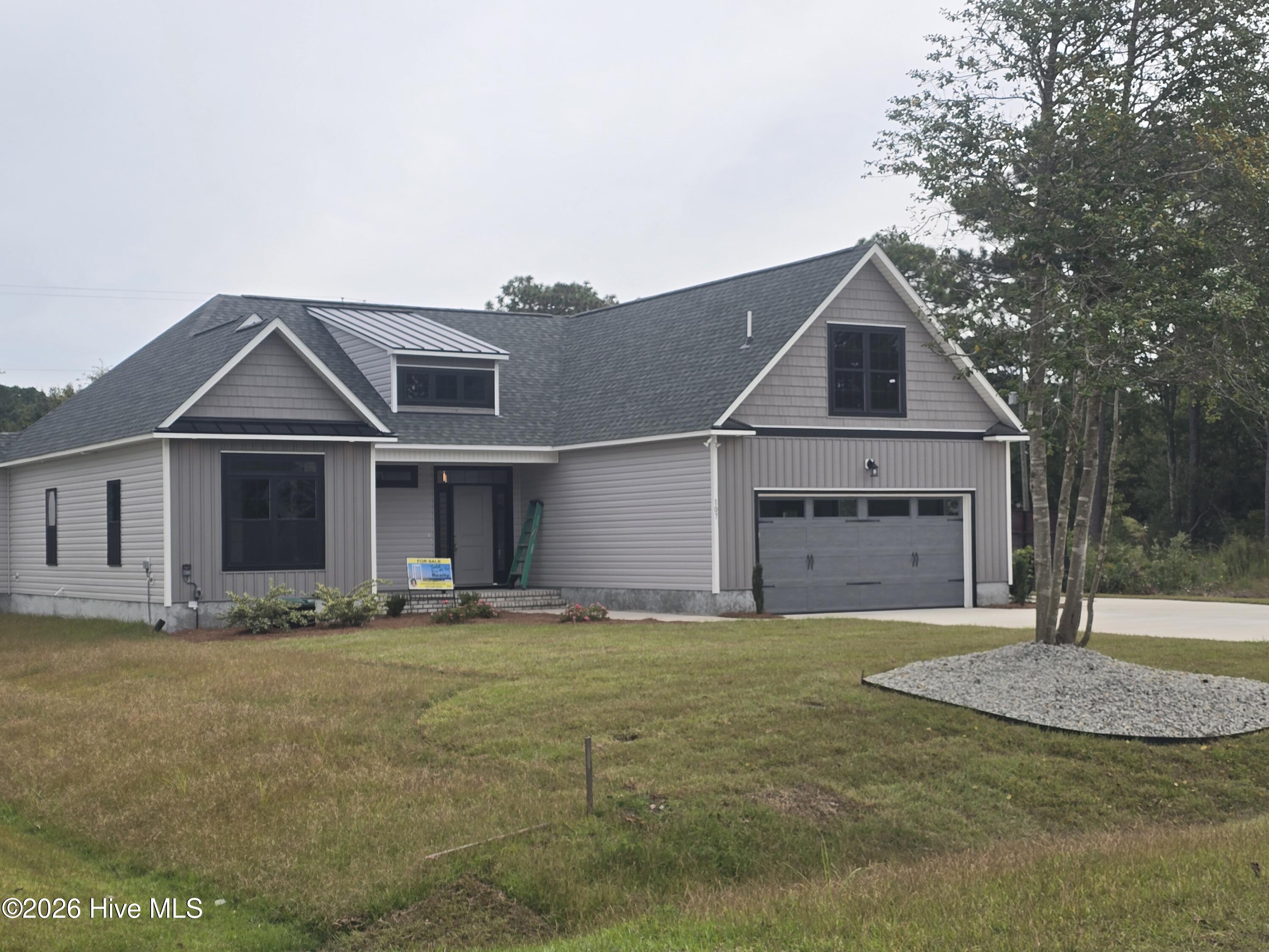 Photo 2 of Single family home for sale at 107 Weathersbee Dr, Hampstead, NC 28443 | MLS# 100607216 | Listing updated on 2026-10-09
