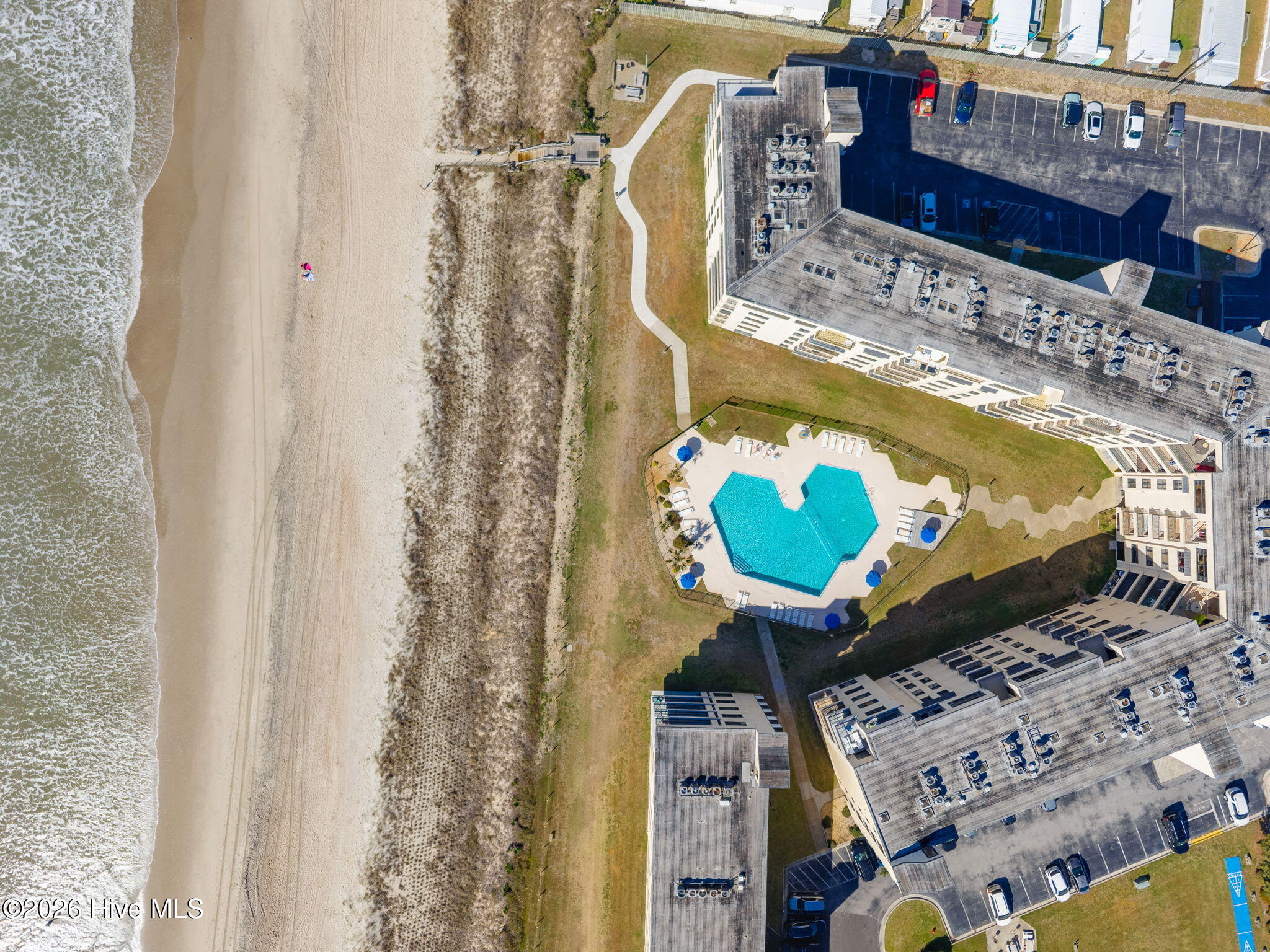 Drone shot of Building B and pool