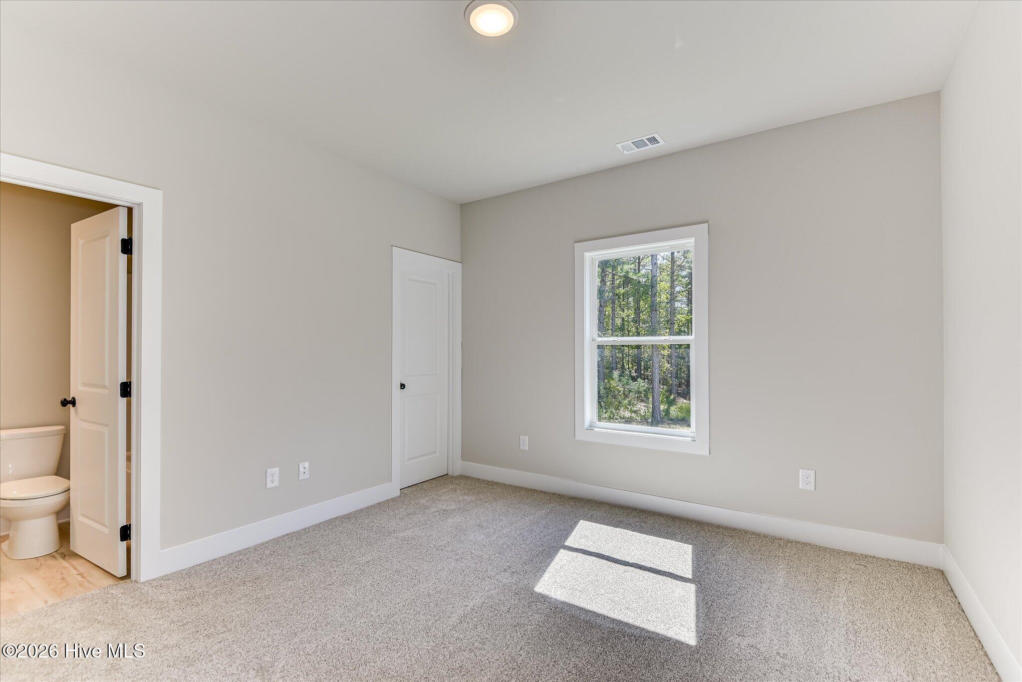 Bedroom 3 with shared access to full bathroom