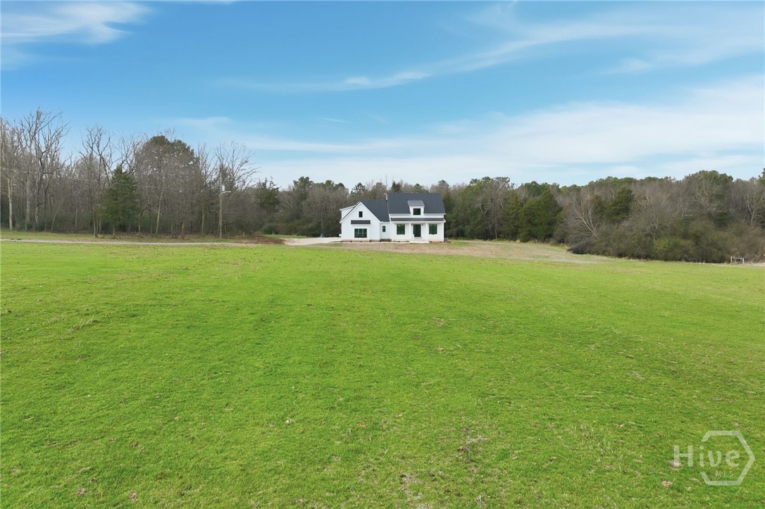 Beautiful new upscale farmhouse on 15.96 acres