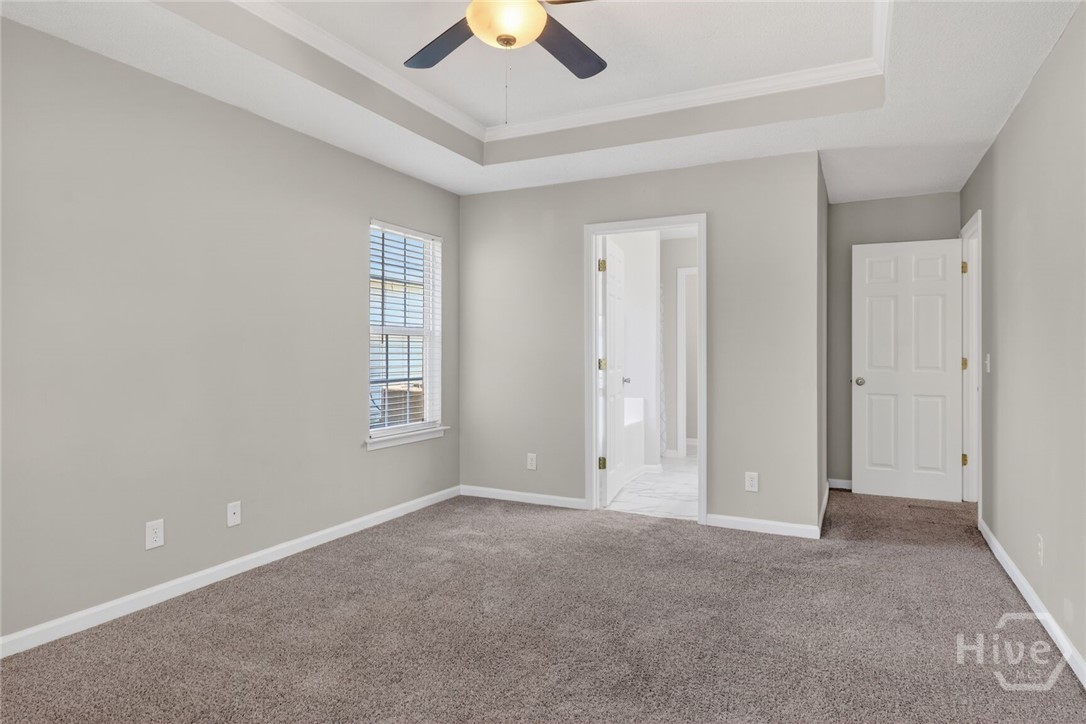 Primary bedroom has large attached bathroom