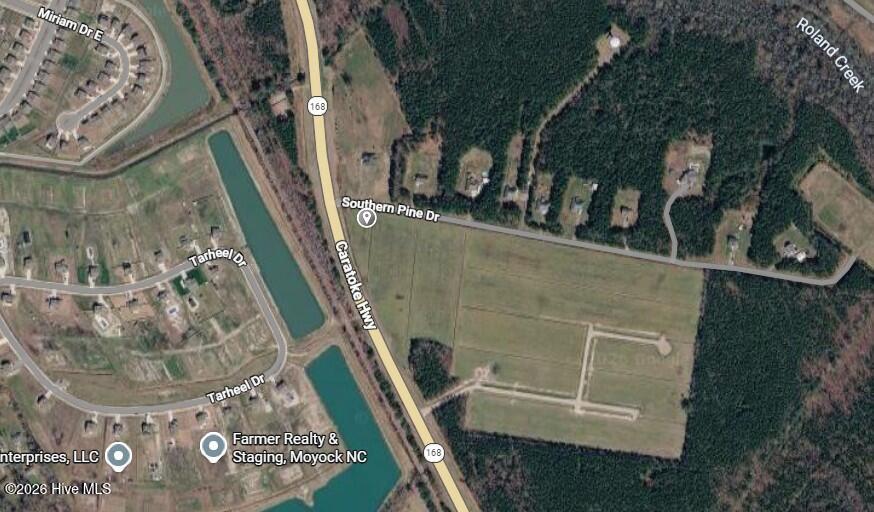Exterior photo of Lot 9 1 Caratoke Avenue, Moyock, NC 27958. MLS: 100599000