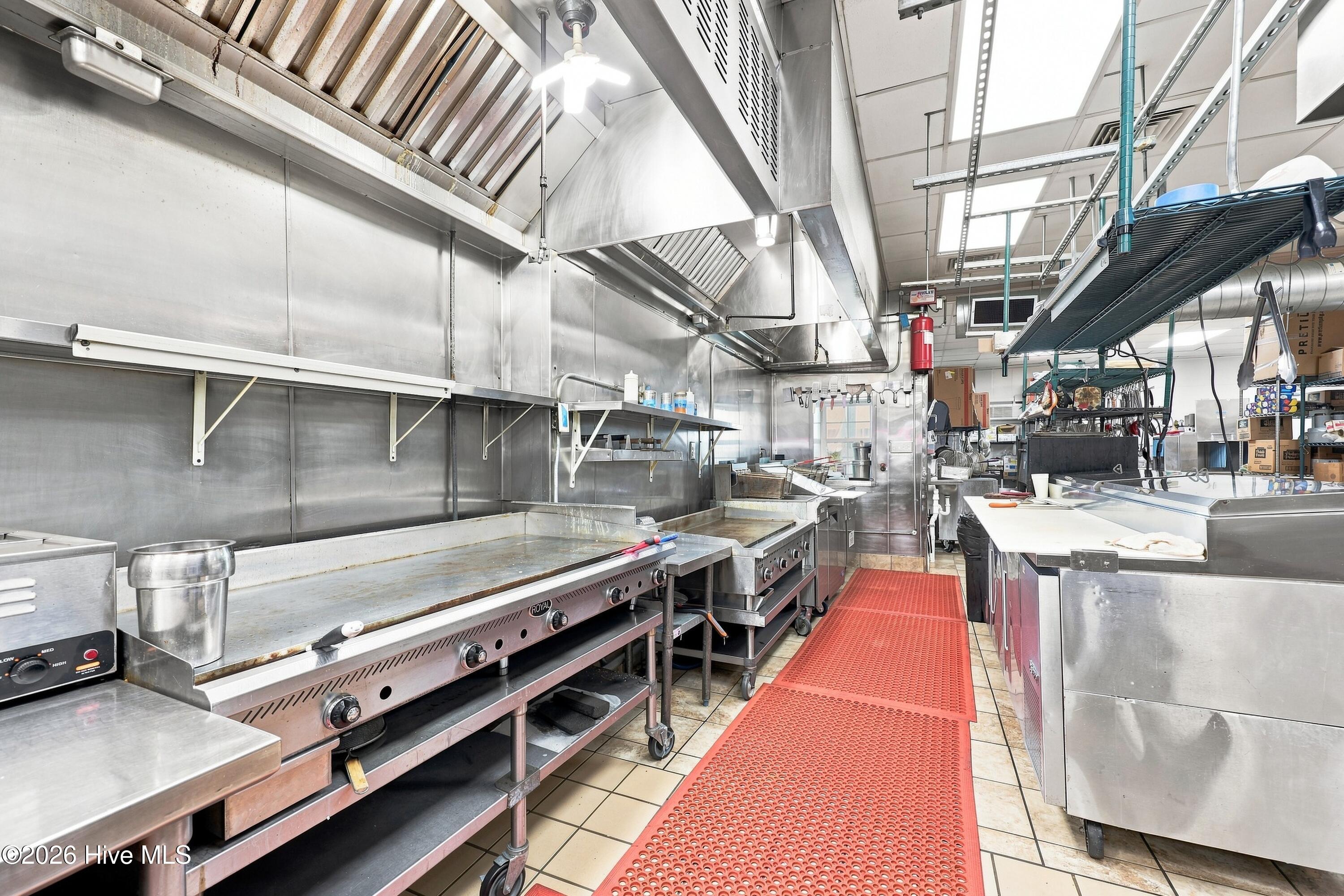 Additional stainless kitchen area.