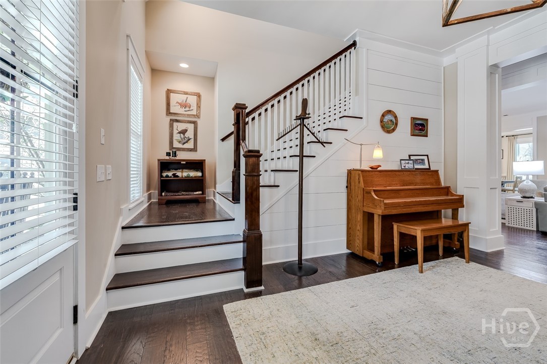 Stairs to upper level with display nook