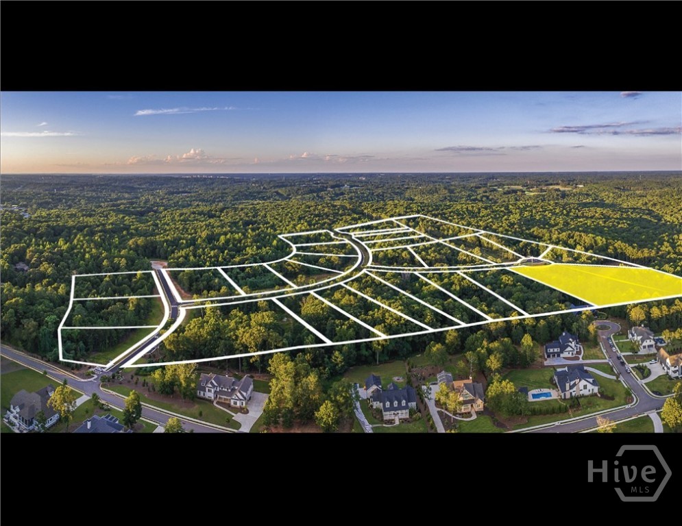 Largest Lot; Wide, Lower Lying, Level Topo; PE Right Side; Cul De Sac; Full Acreage is private (including storm water retention pond) Create the lifestyle and home of your dreams in Athens' newest development, Spartan Manor! With an Athens address in Oconee County, this community offers unrivaled convenience with access to award winning schools. Exquisite homes will be built on lots ranging from 1.5-4.5 acres. Nestled amongst mature hardwoods and gently rolling hills, lots provide privacy and tranquility. Spartan Manor, where beauty and convenience come together to create a community that will captivate you! Reward yourself with the extraordinary lifestyle you deserve. Agent and buyer shall review covenants and design guidelines on Spartan Manor website; https://spartanmanorhomes.com/wp-content/uploads/2025/05/spartan_manor_design_guidelines_2025_05.pdf