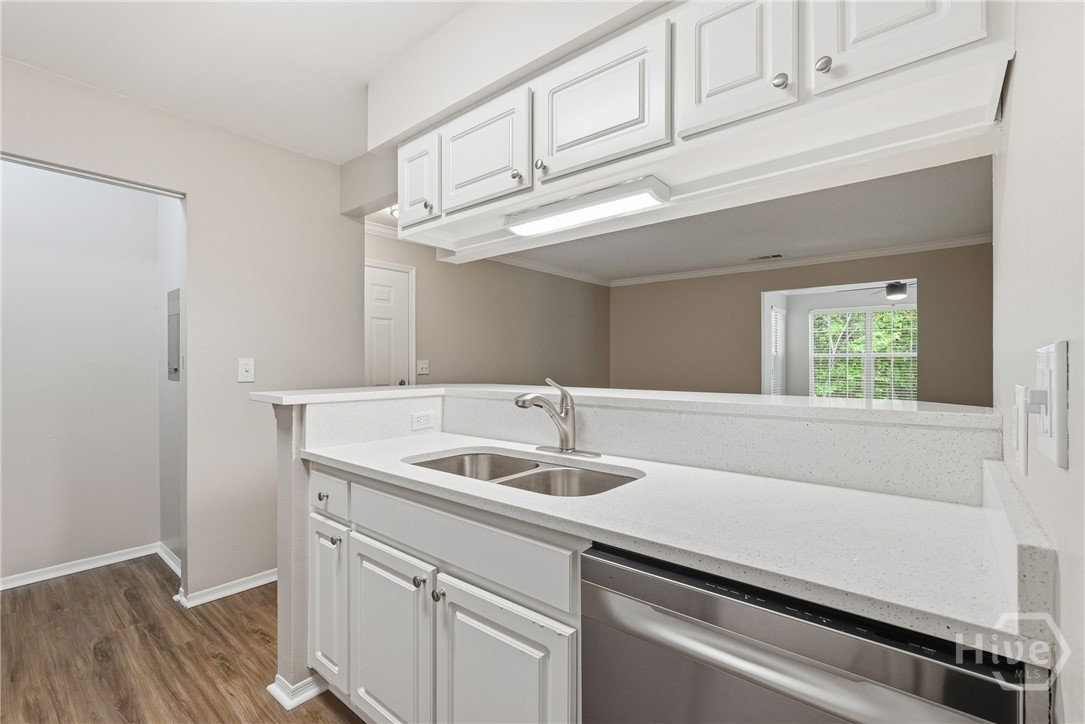 Opening To The Left is the Laundry Room!