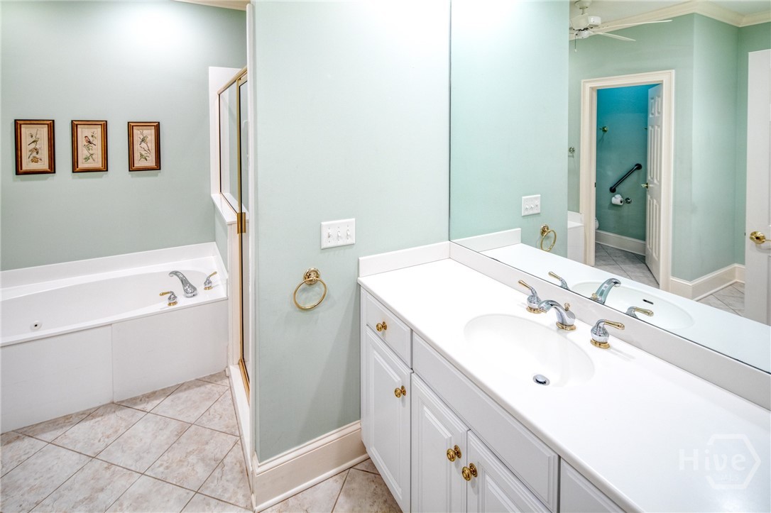 Primary bath with Corian skink top
