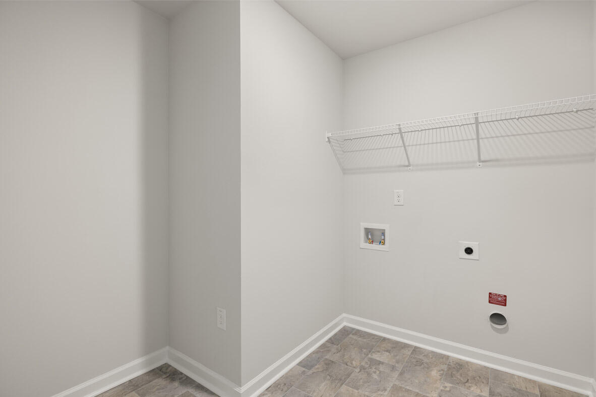 Second level laundry room with shelving