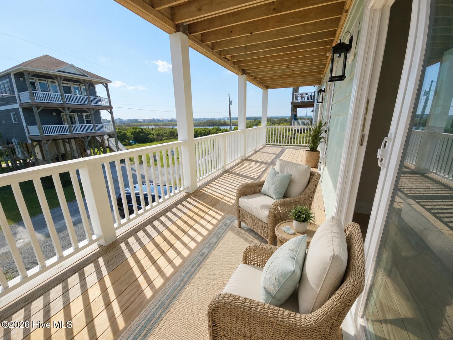 Virtually staged photo of 1st foor porch
