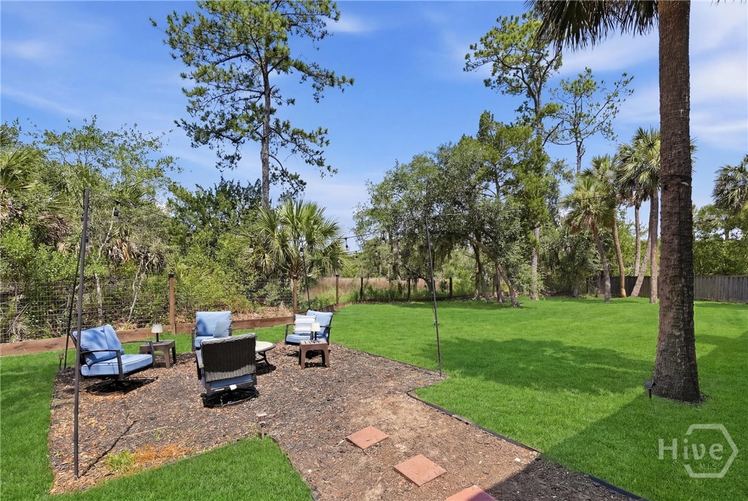 Firepit area. Grass digitally enhanced for marketing.