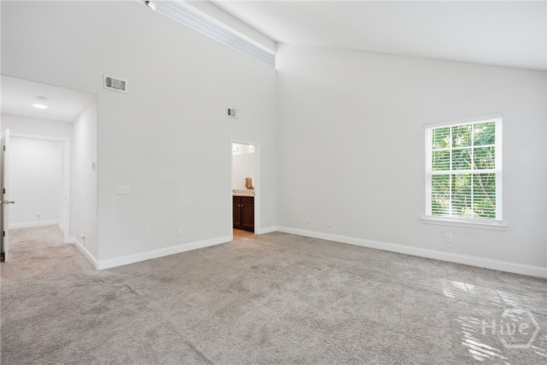 Primary bedroom features an on suite bathroom.