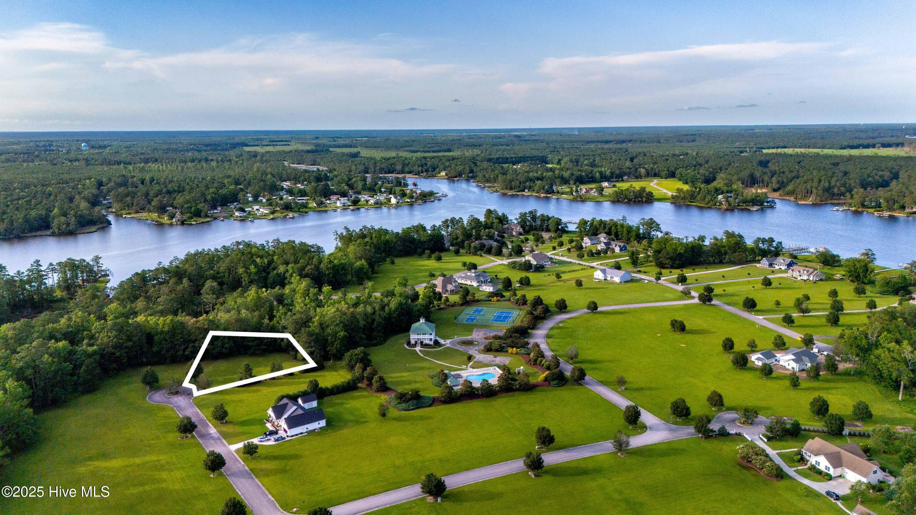 330 Southern Way Arapahoe, North Carolina Build your dream home in the serene waterfront community of Shine Landing. This beautiful, wooded homesite on Southern Way includes a deeded boat slip, providing easy access to the Neuse River and Intracoastal Waterway. Enjoy the privacy of a natural setting combined with the amenities of a gated neighborhood—clubhouse, pool, fitness center, tennis courts, and walking trails. Conveniently located near Oriental and New Bern, this property offers an exceptional lifestyle for boating enthusiasts, nature lovers, or anyone seeking a peaceful coastal retreat.
