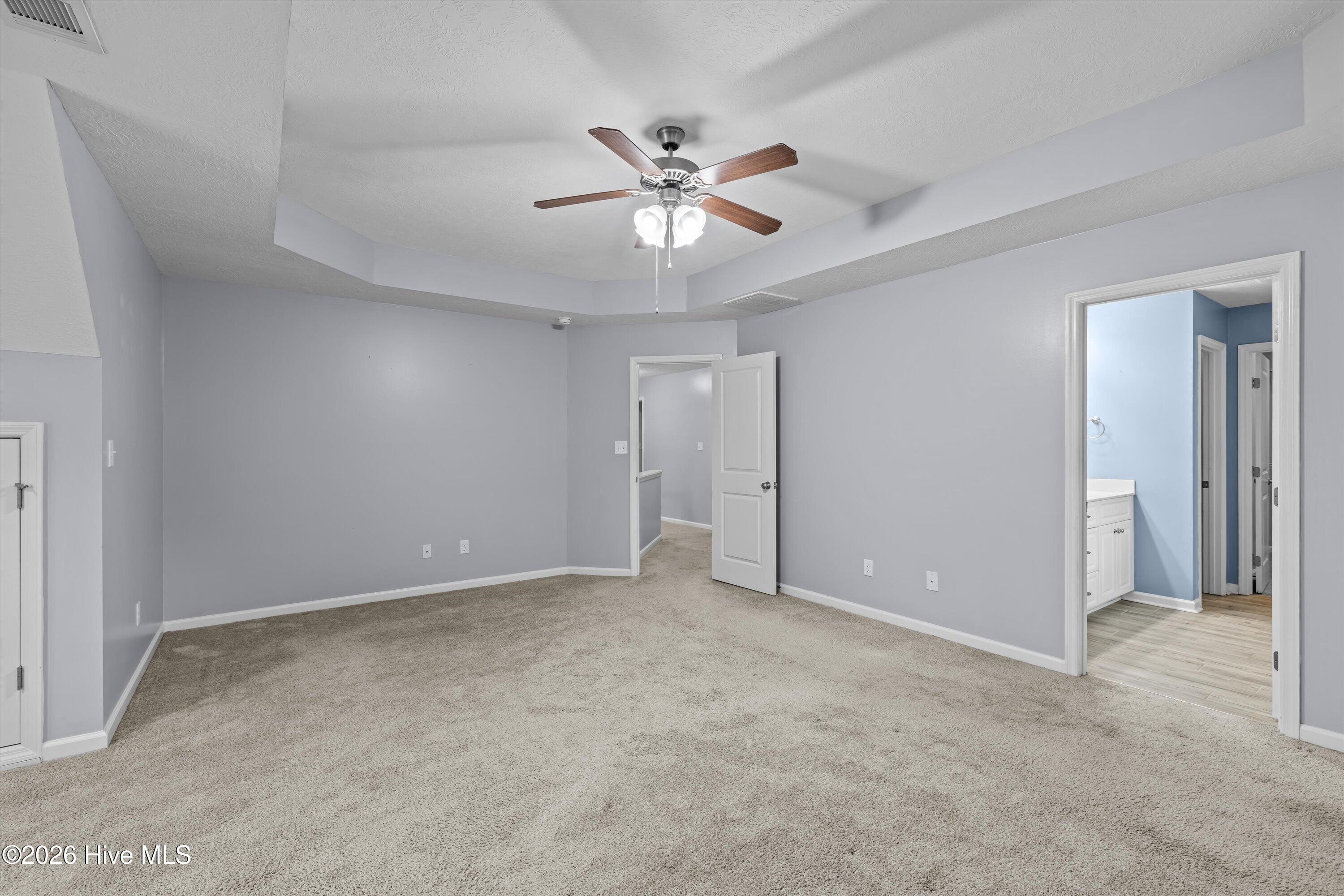 Upstairs primary suite with sitting area