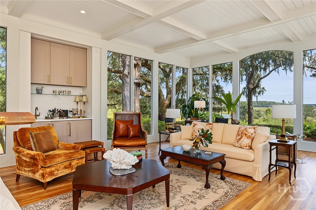Living room with wet bar, including mini fridge and ice maker