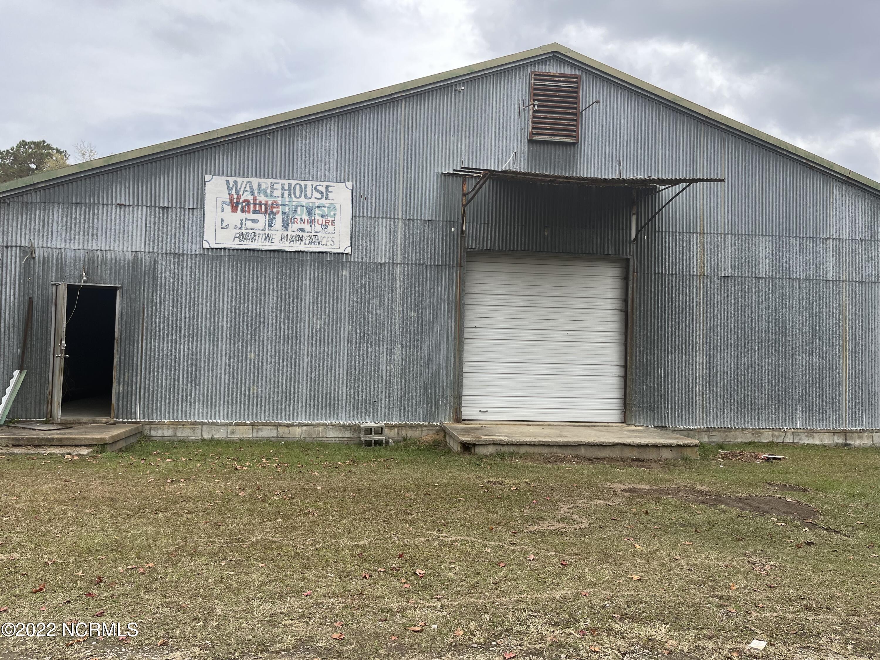 WOW!  CHECK OUT THIS AWESOME WAREHOUSE LOCATED ON WEST MAIN'S BUSY THOROUGHFARE IN WILLIAMSTON, NC!!  This incredible warehouse has All Concrete Flooring and 6000' of totally Open Space...For your New business ventures or to Expand your already existing business...This incredible warehouse will be a Major Investment for your Needs and Wants!  Situated on 1.7 Acres, just imagine all the additional possibilities that are waiting for You!  This EXCEPTTIONAL 6000' Warehouse with it's 1.7 Acres is indeed, a Rare Find!!  Oh, the Opportunities that await....  And ''THE PRICE IS RIGHT!!''