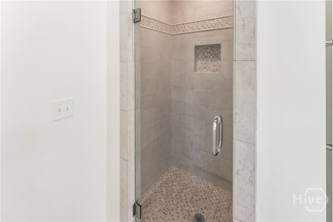 Master shower with beautiful tile