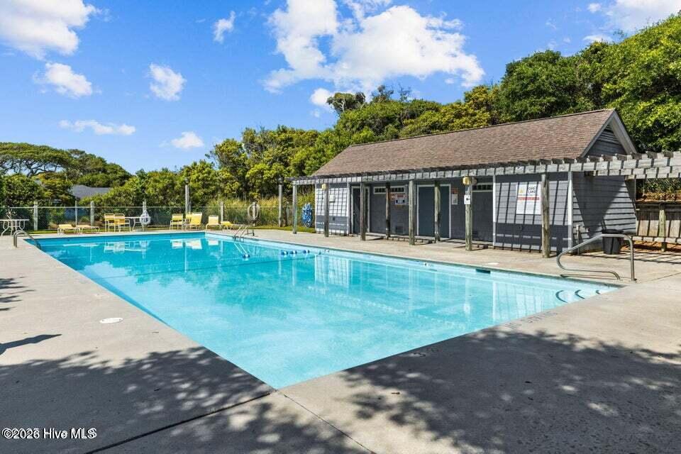 Exterior photo of 535 Salter Path Road Unit 2, Pine Knoll Shores, NC 28512. MLS: 100598586