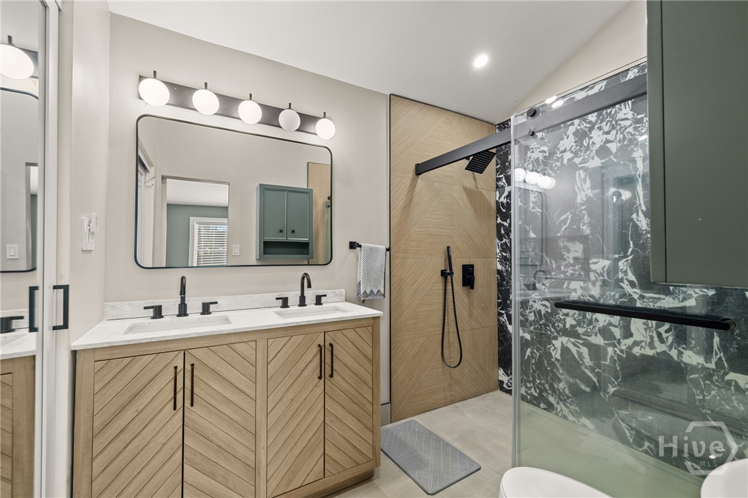 Updated primary bathroom with double vanity