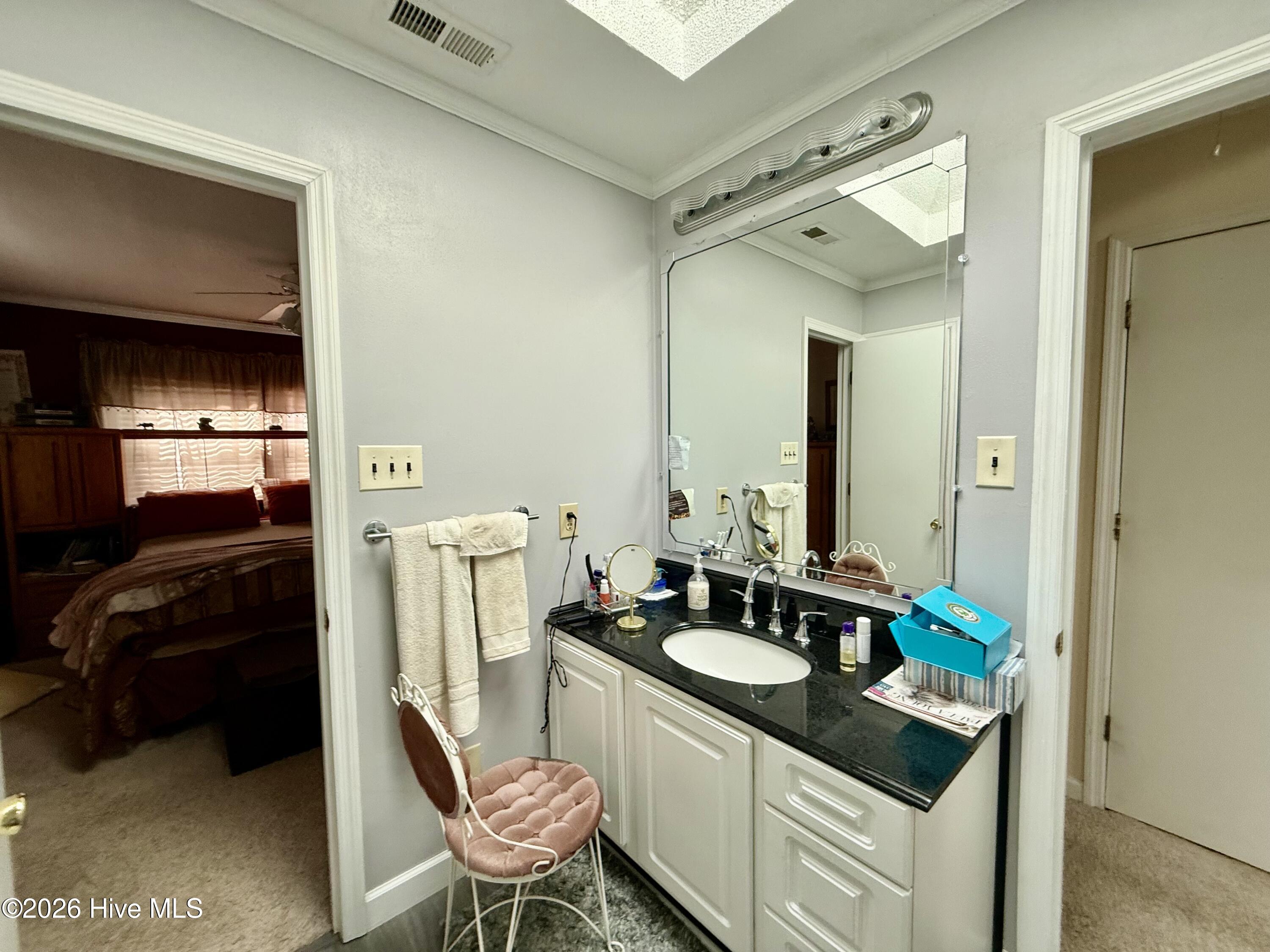 Owner bath adjoins hallway also