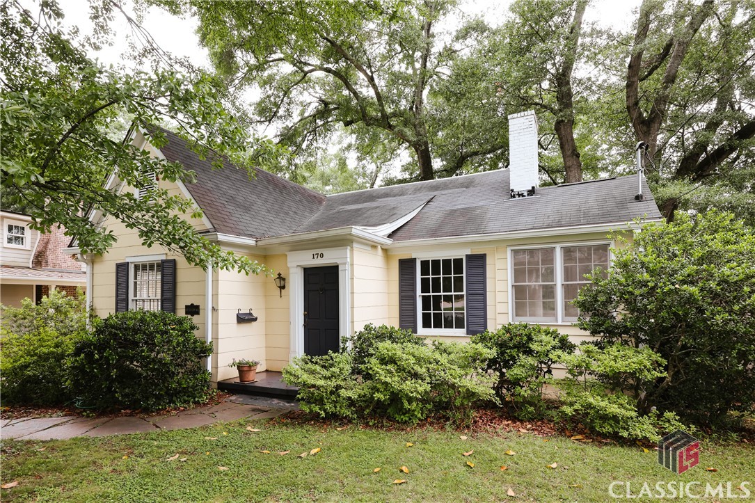 Precious Five Points bungalow that has been lovingly maintained and owner occupied in a fabulous location. The sweet foyer entrance has a coat closet and opens into the living room with a fireplace that is open on both sides to a sunroom. Off the living room is a dining room that flows into the kitchen, and there are two bedrooms and a hall access bathroom. One of the bedrooms has French doors that opens onto a back deck and a private backyard with mature shade trees. Upstairs is a cute library area, a bathroom, and a bedroom with a large storage closet.  There is off-street parking, a one-car garage, and a cute little landscaped walkway. Easy access to all of your favorite Five Points stops, to campus, to all your favorite sporting events, and even a quick easy jaunt to downtown.