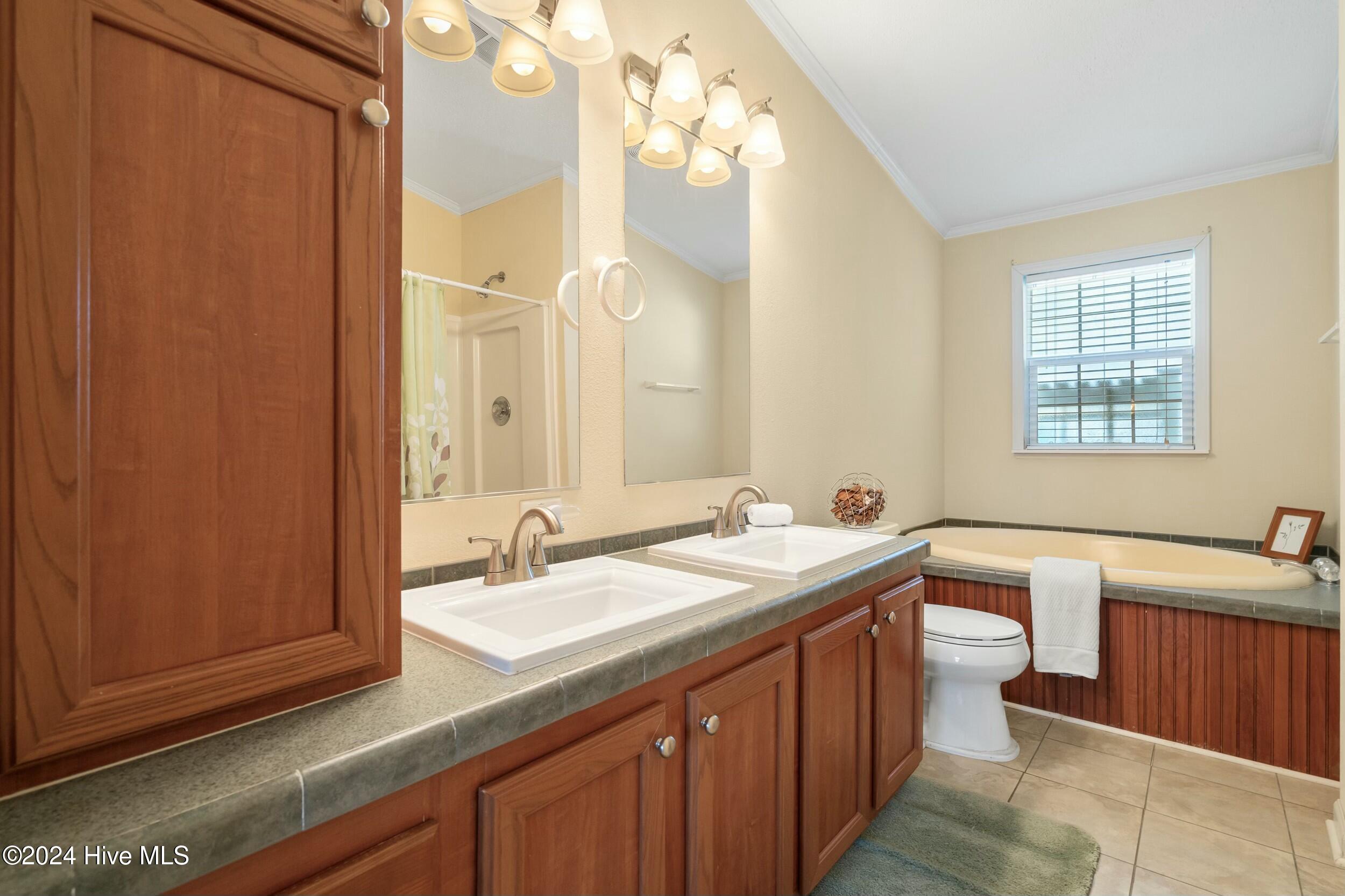 1104 Captains Court, Carolina Shores, NC 28467 – photo 18: Owner's Bathroom