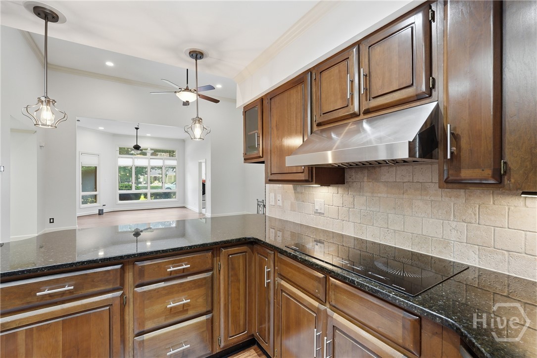 Breakfast bar and family room. You won't be excluded from the fun when cooking!