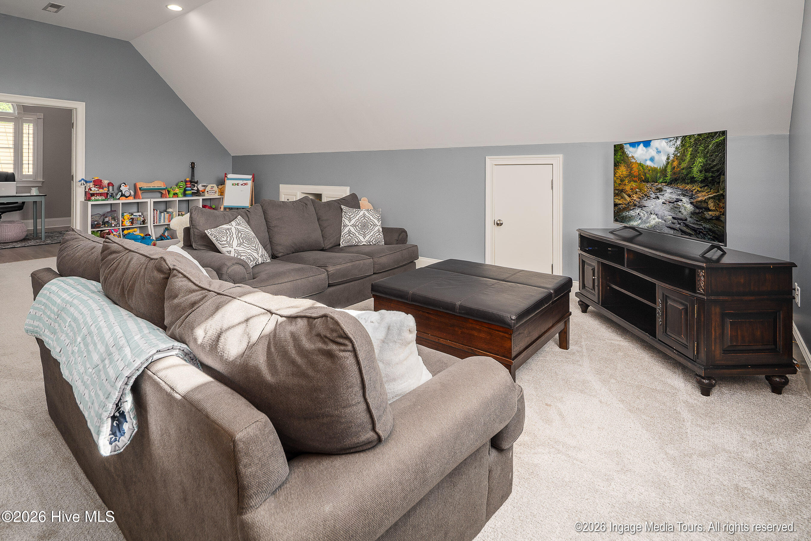 Bonus Room large enough for play area and media viewing.