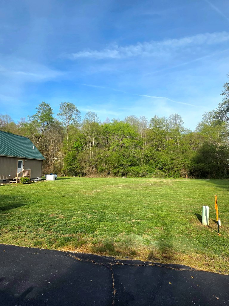 Beautiful lot with creek in the wood line