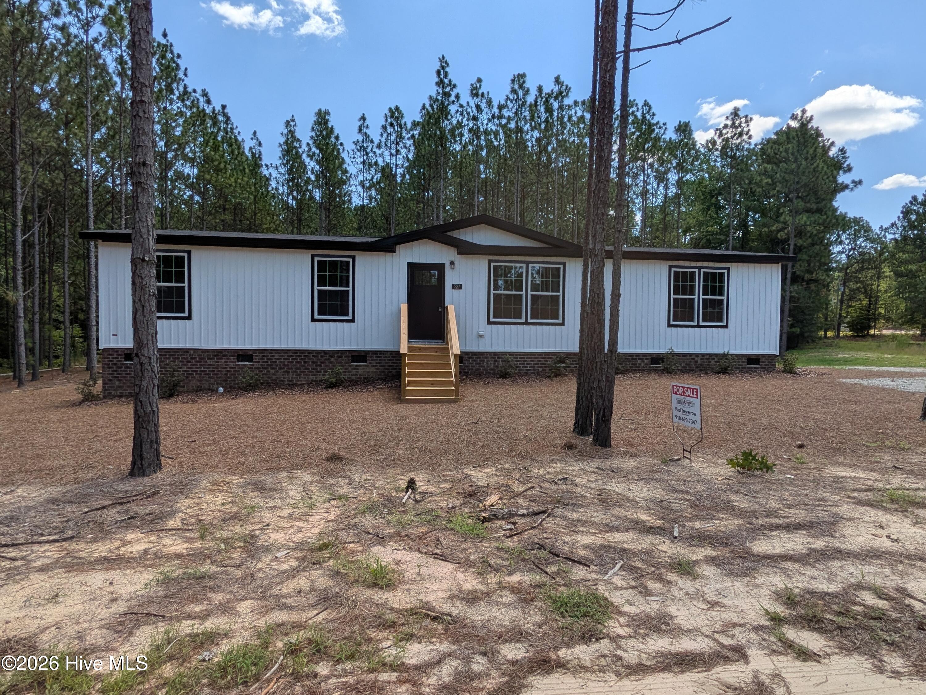 Exterior photo of 521 Veronica Way, West End, NC 27376. MLS: 100576581