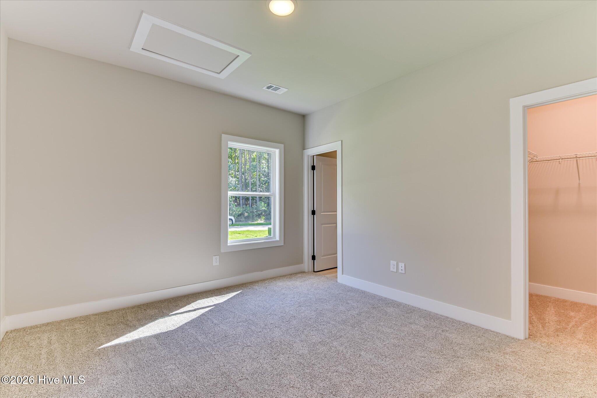 Bedroom 2 with shared access to full bathroom