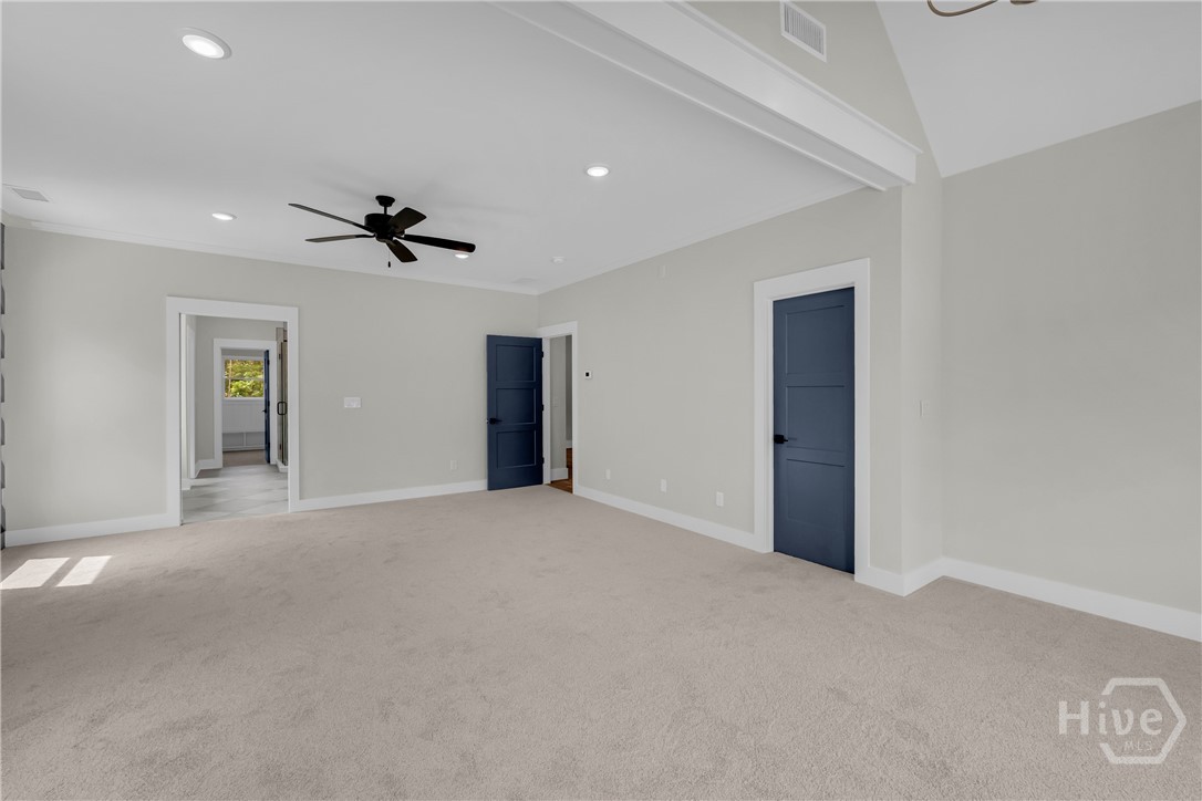 The spectacular owner’s retreat is a destination of its own, complete with a designer accent wall, private sitting area, pocket doors leading to a spa-inspired bath, and a unique secret passageway that adds a touch of charm and character you won’t find elsewhere.